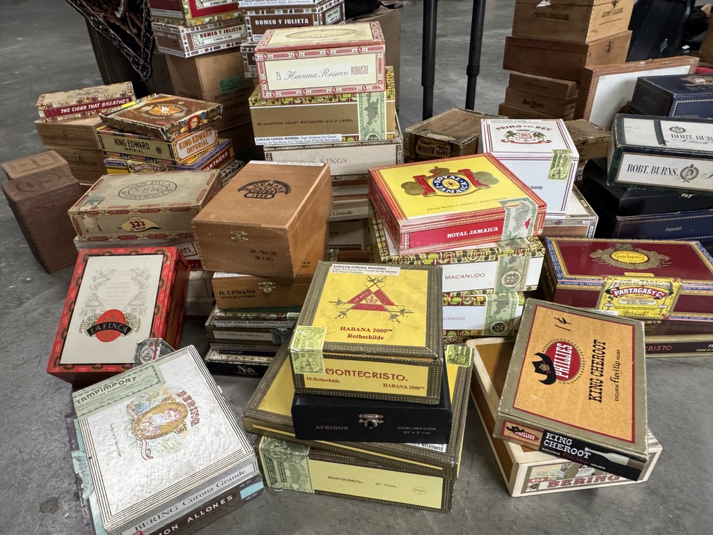 A collection of decorative vintage cigar boxes