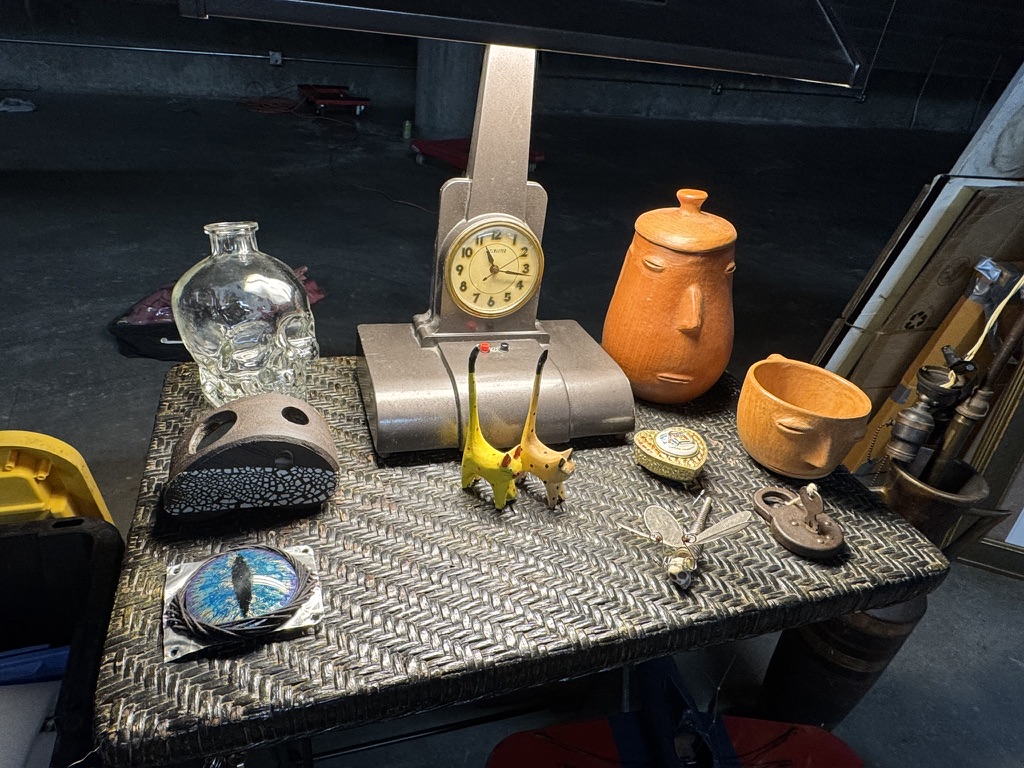 Small treasures, pottery, and a vintage clock