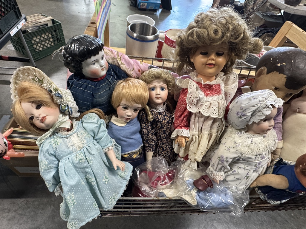 An assortment of vintage dolls