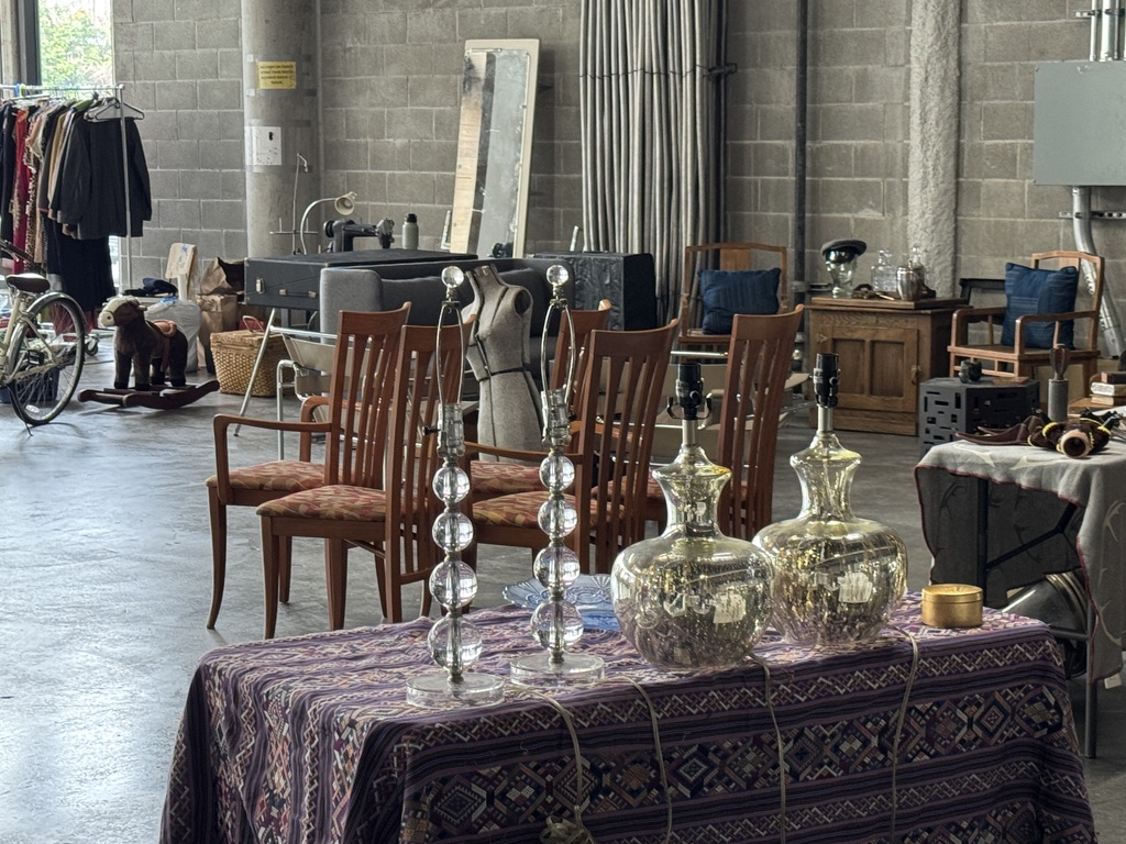 Glass lamps and wooden furniture at the market