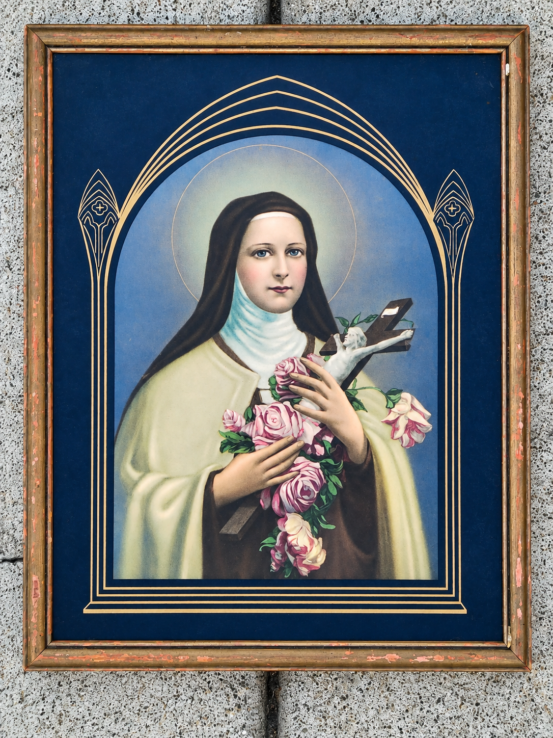 A framed vintage religious portrait