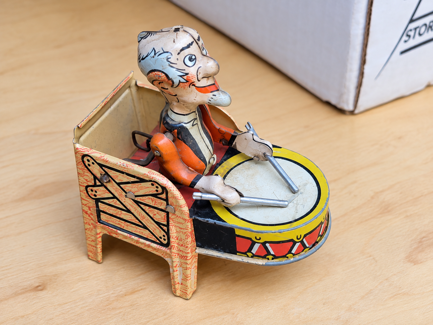 A vintage tin drummer toy